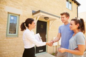 couple buying a house