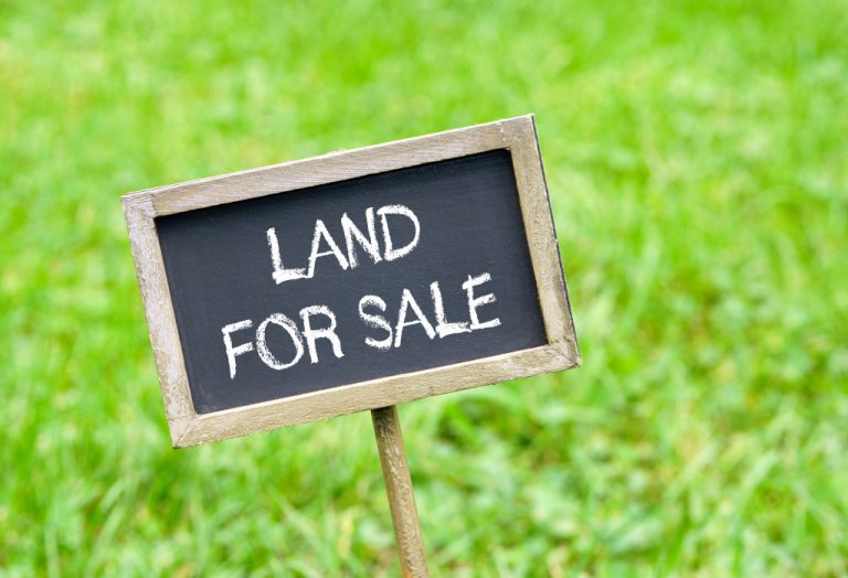 A land with a for sale sign