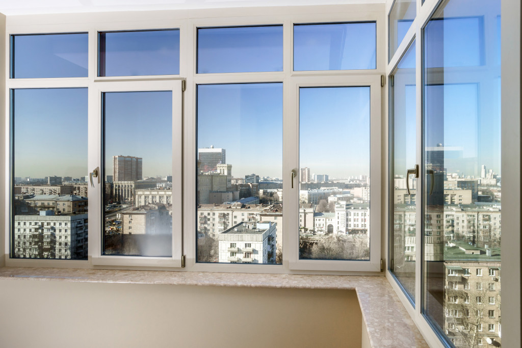 a view of the city through windows